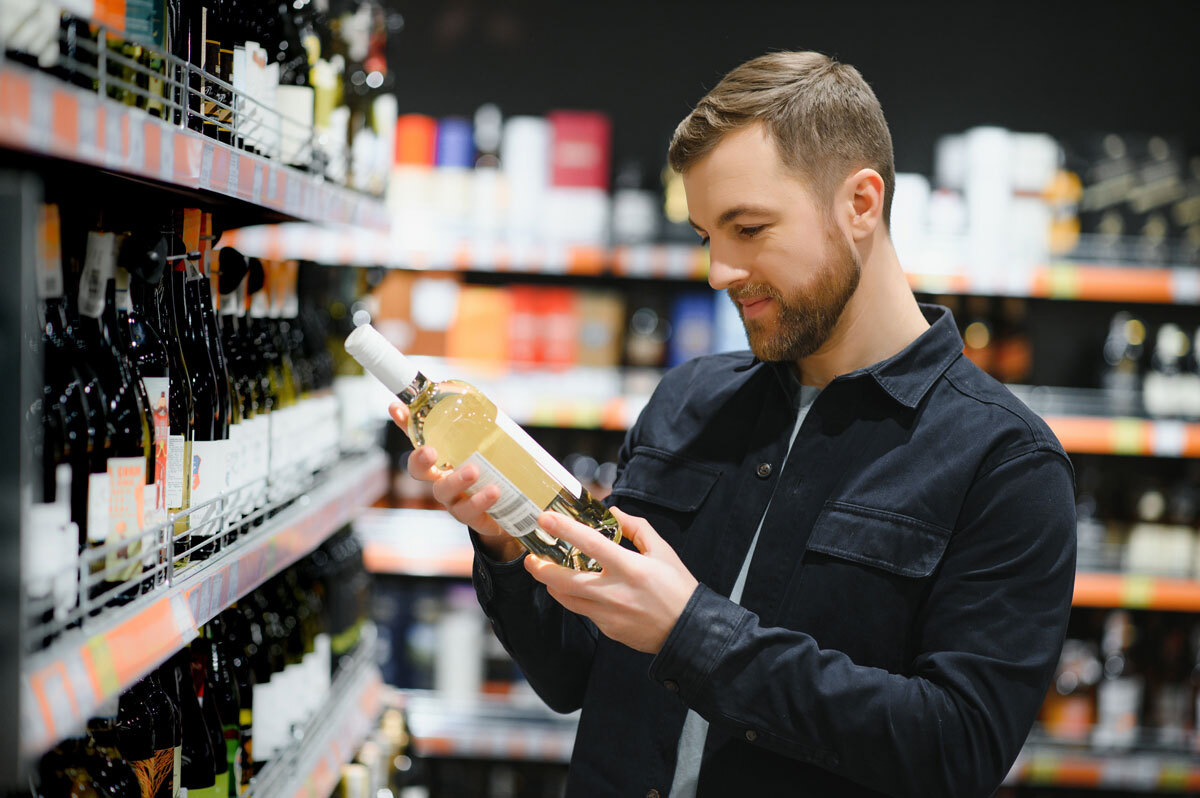 a man selecting white wine