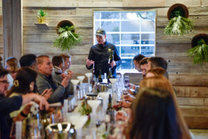 Man speaking at a private event at Meadowcroft