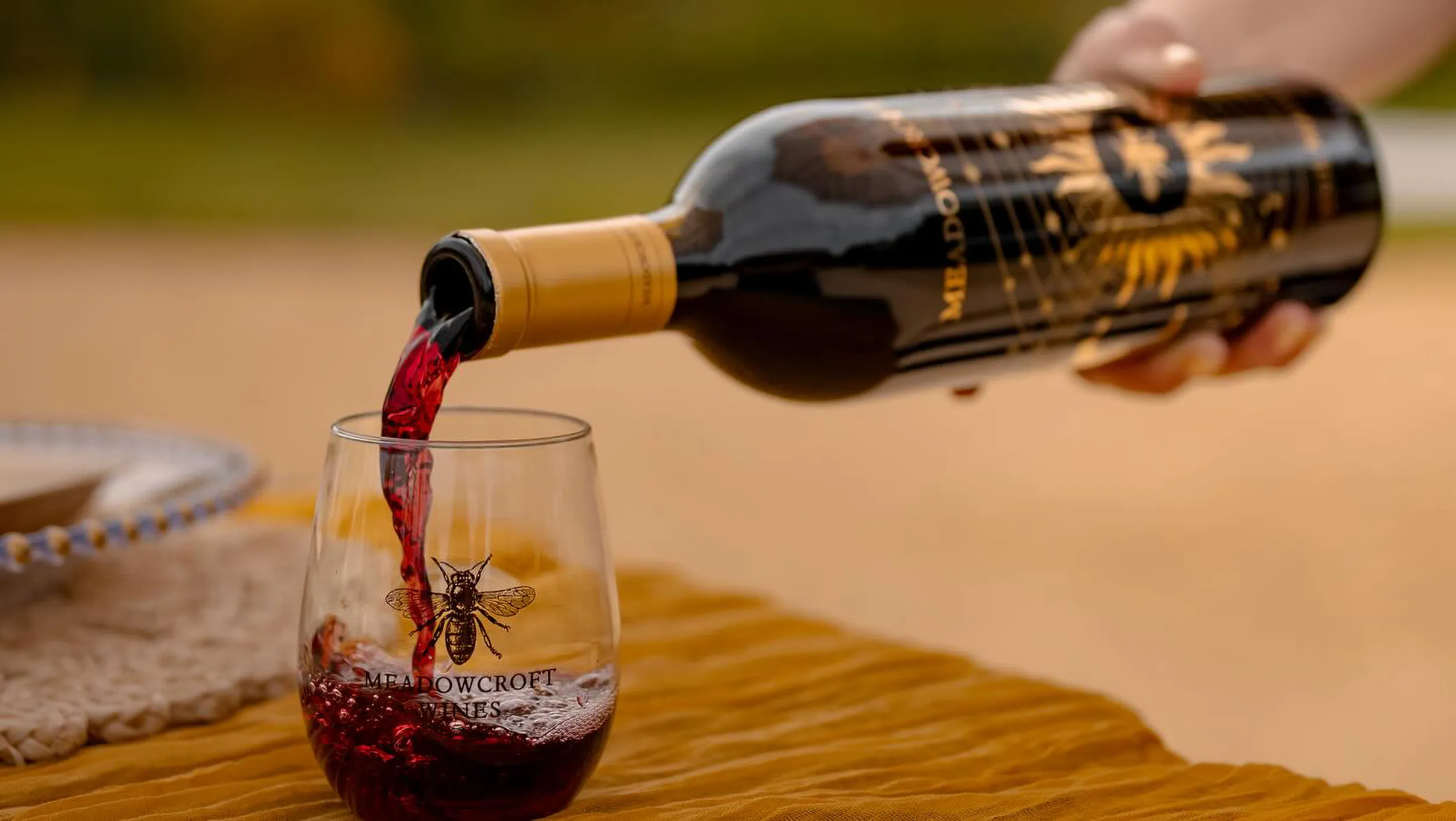 Meadowcroft wine being poured into a glass
